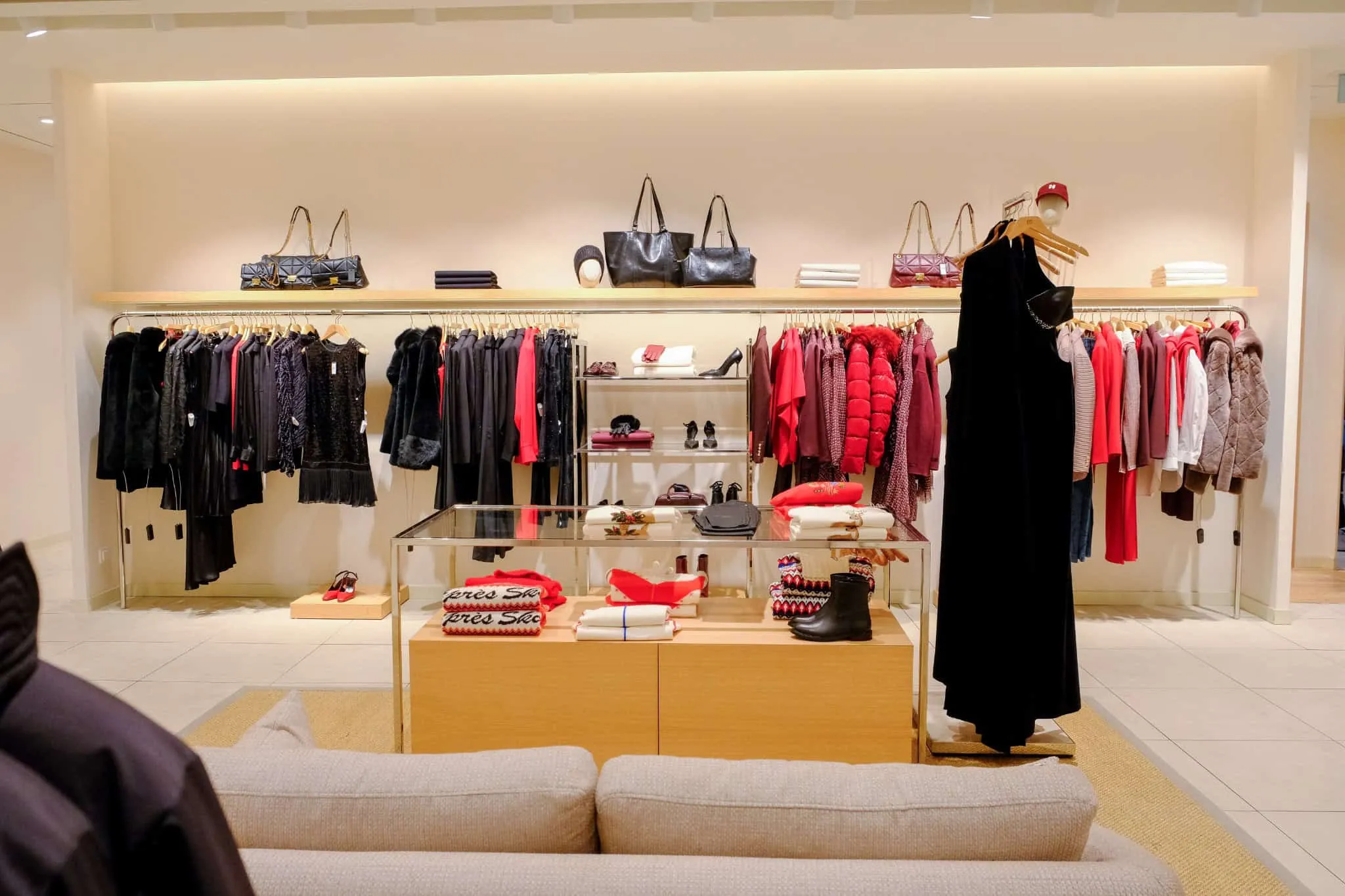 Women's red section of NetWork Stores by Boytorun Architects in Turkey