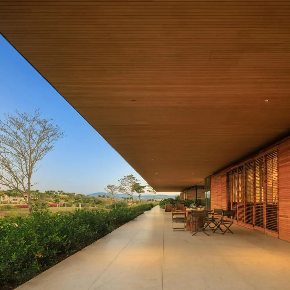 House TM – long terrace with balcony facing landscape, Brazil