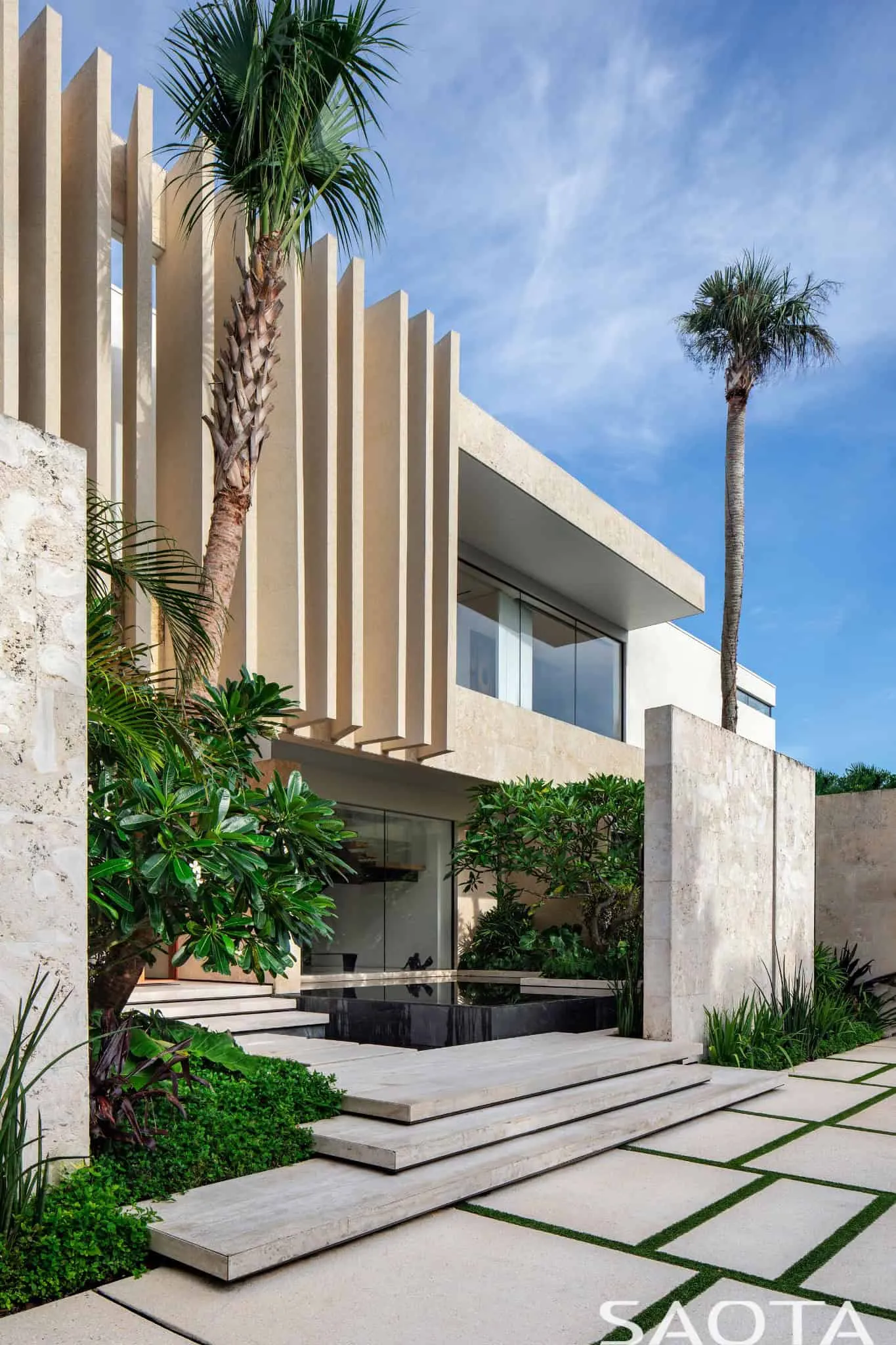 Entrance courtyard with reflecting pond and steps