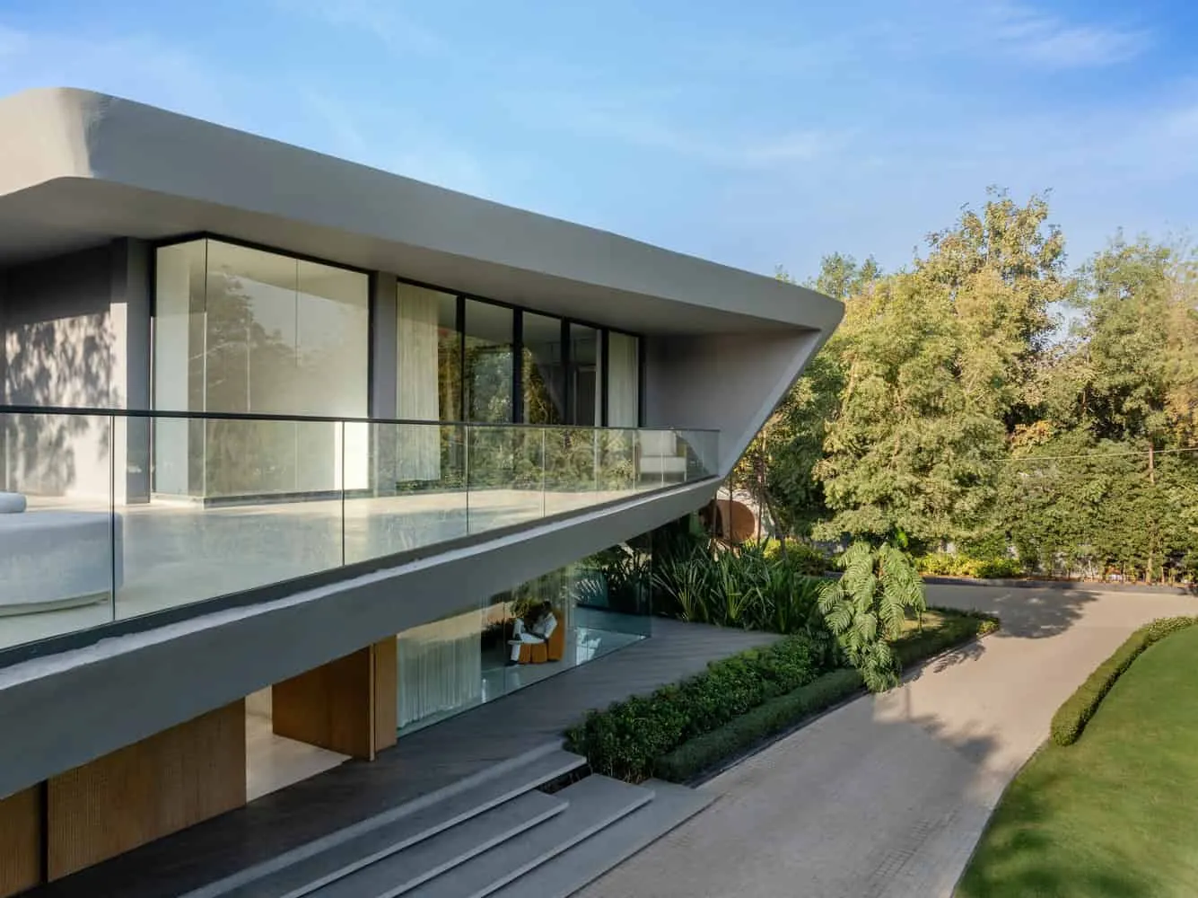 Long balcony with full glazing in relaxation zones of House NINE X NINE in Gandhinagar