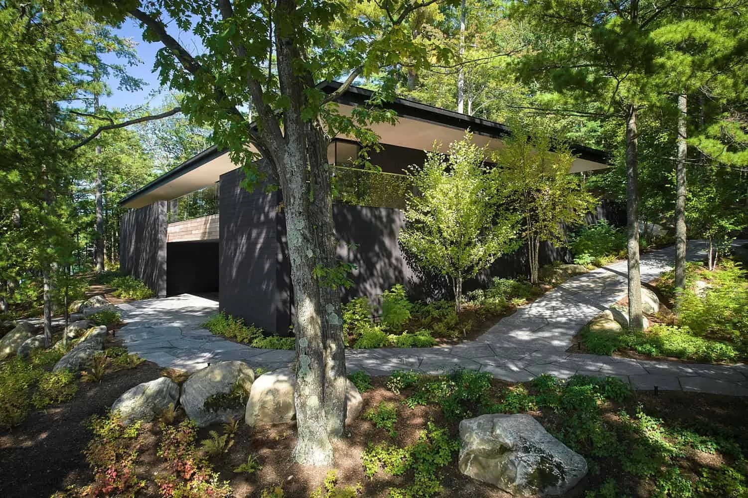 Garage Portal and Stone Path of Sagamore North Cottage by Akb Architects, Mask