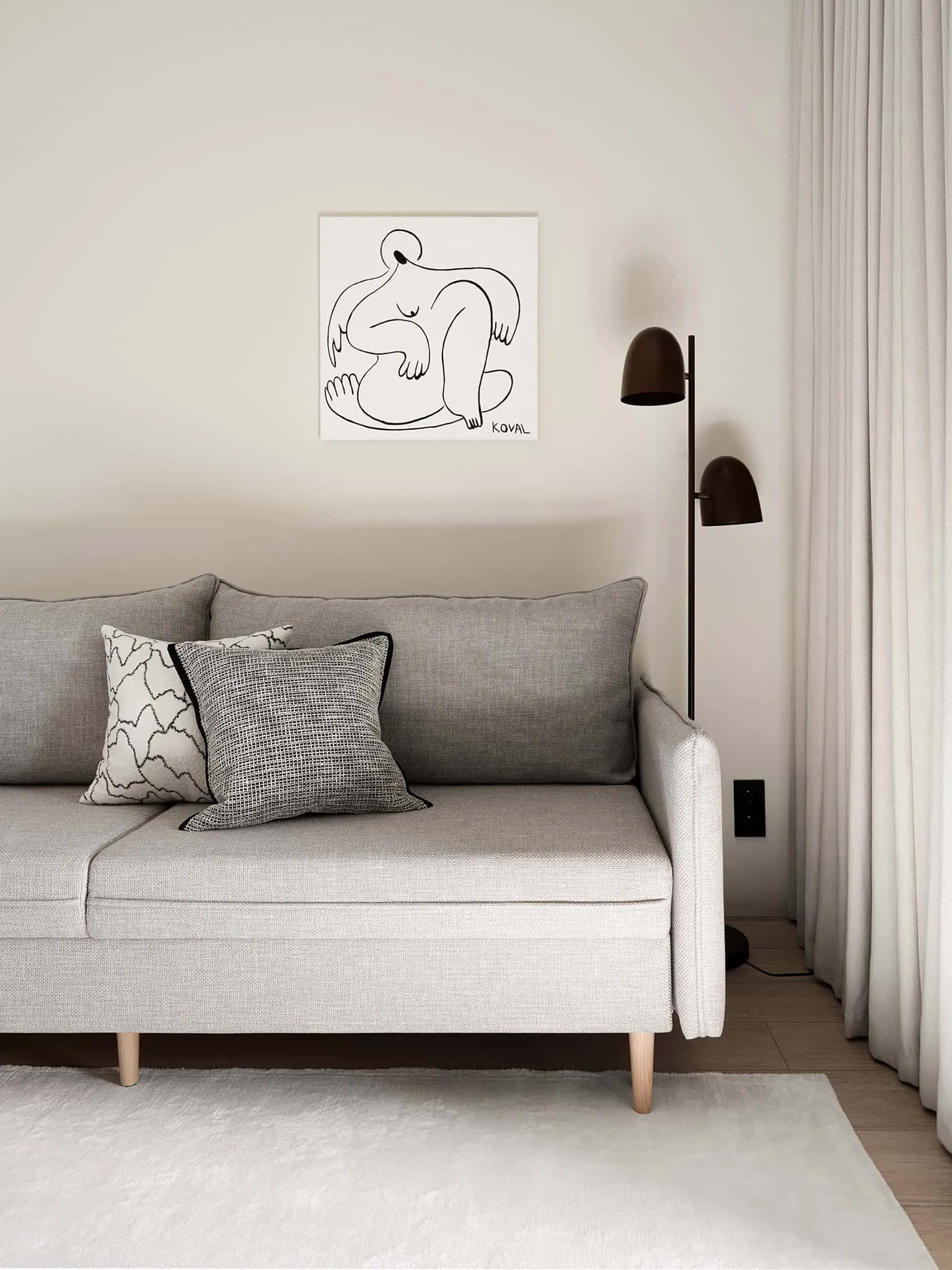 Guest room sofa with graphic art and table lamp - warm minimalism in Moscow