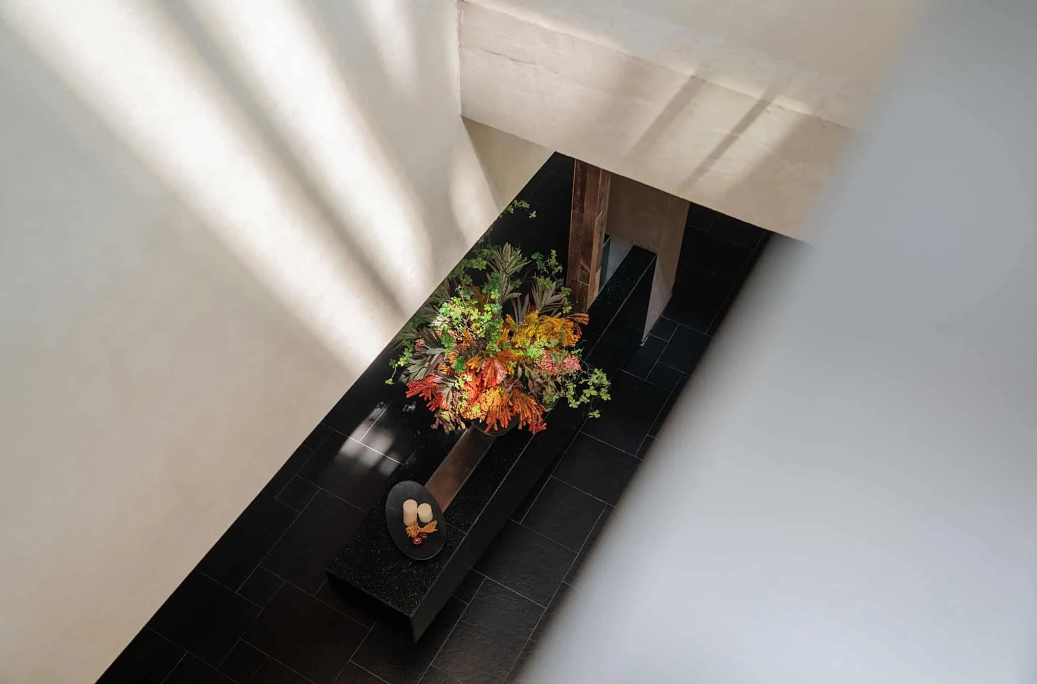Yang Sin Lobster · Bai Jia Hu, by IN.X — floral decor in lobby from above, Nanjing, China