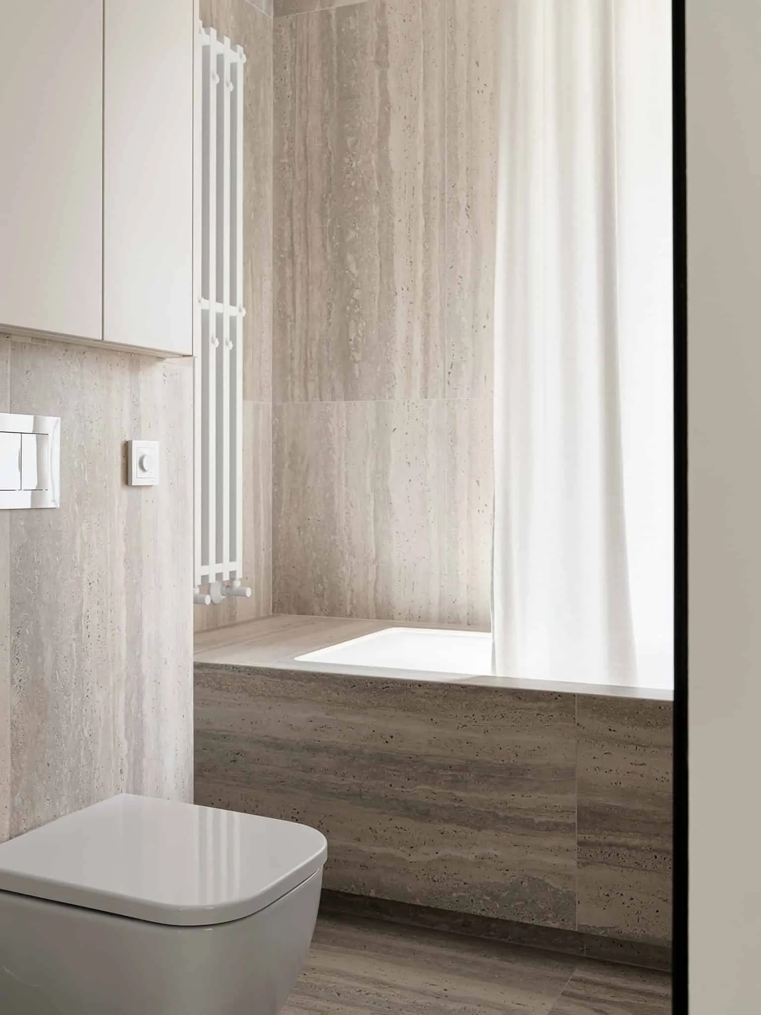 Bathtub details with vertical radiator - warm minimalism, Moscow