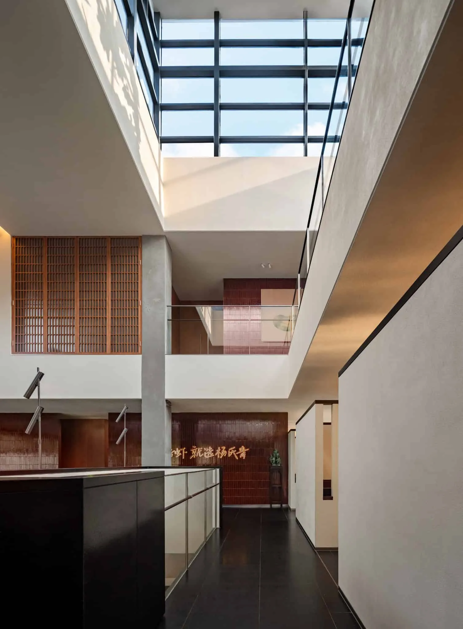 Yang Sin Lobster · Bai Jia Hu, by IN.X — atrium with lantern, Nanjing, China