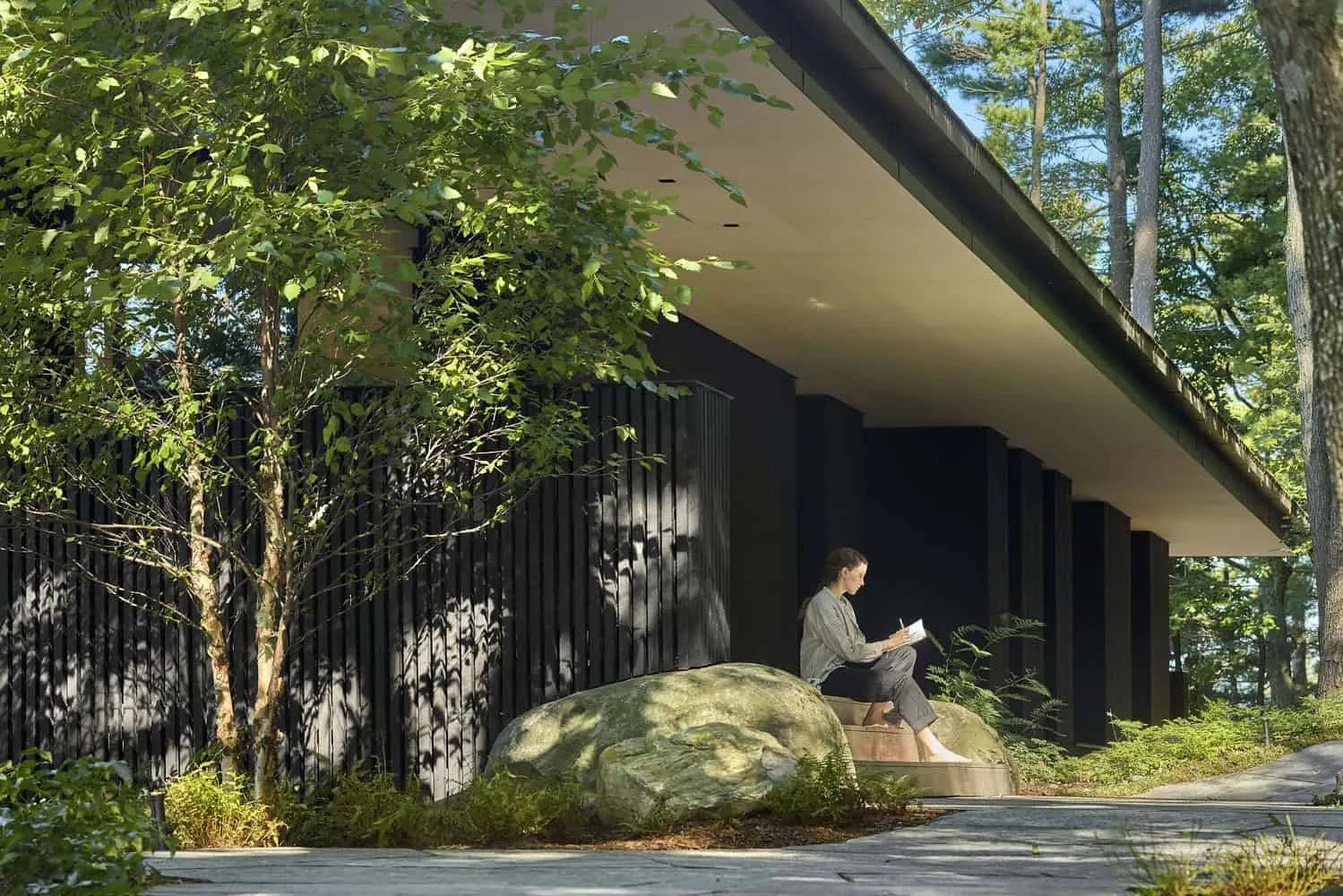 Covered Walkway with Stone Seating of Sagamore North Cottage by Akb Architects, Mask