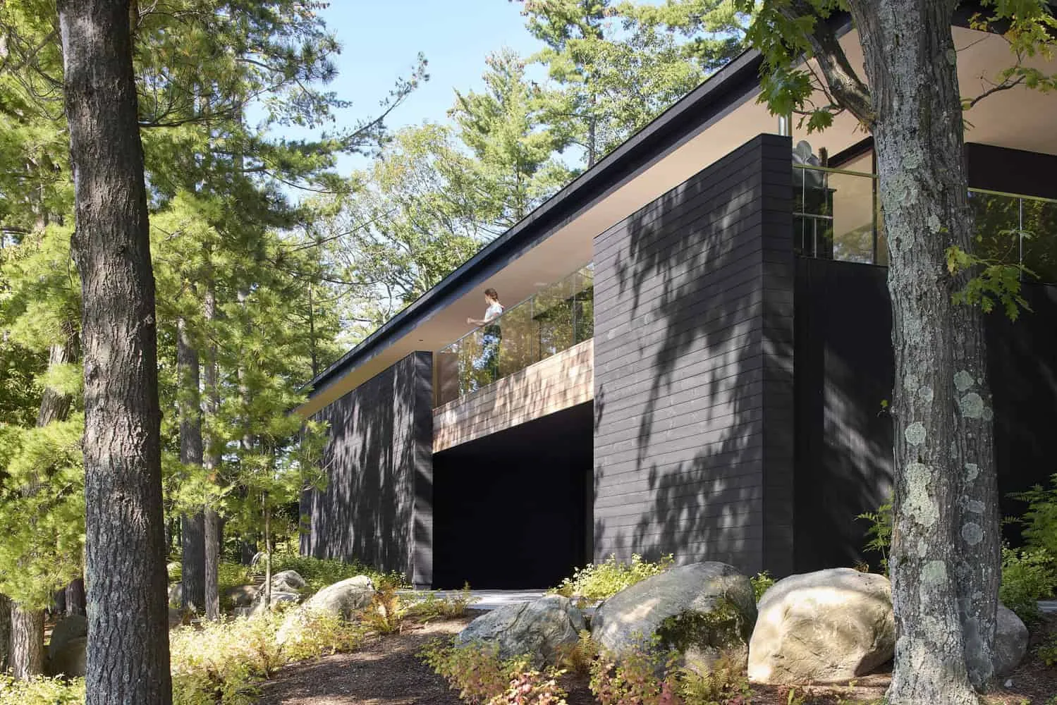 Balcony with Deep Roof Overhang of Sagamore North Cottage by Akb Architects, Mask