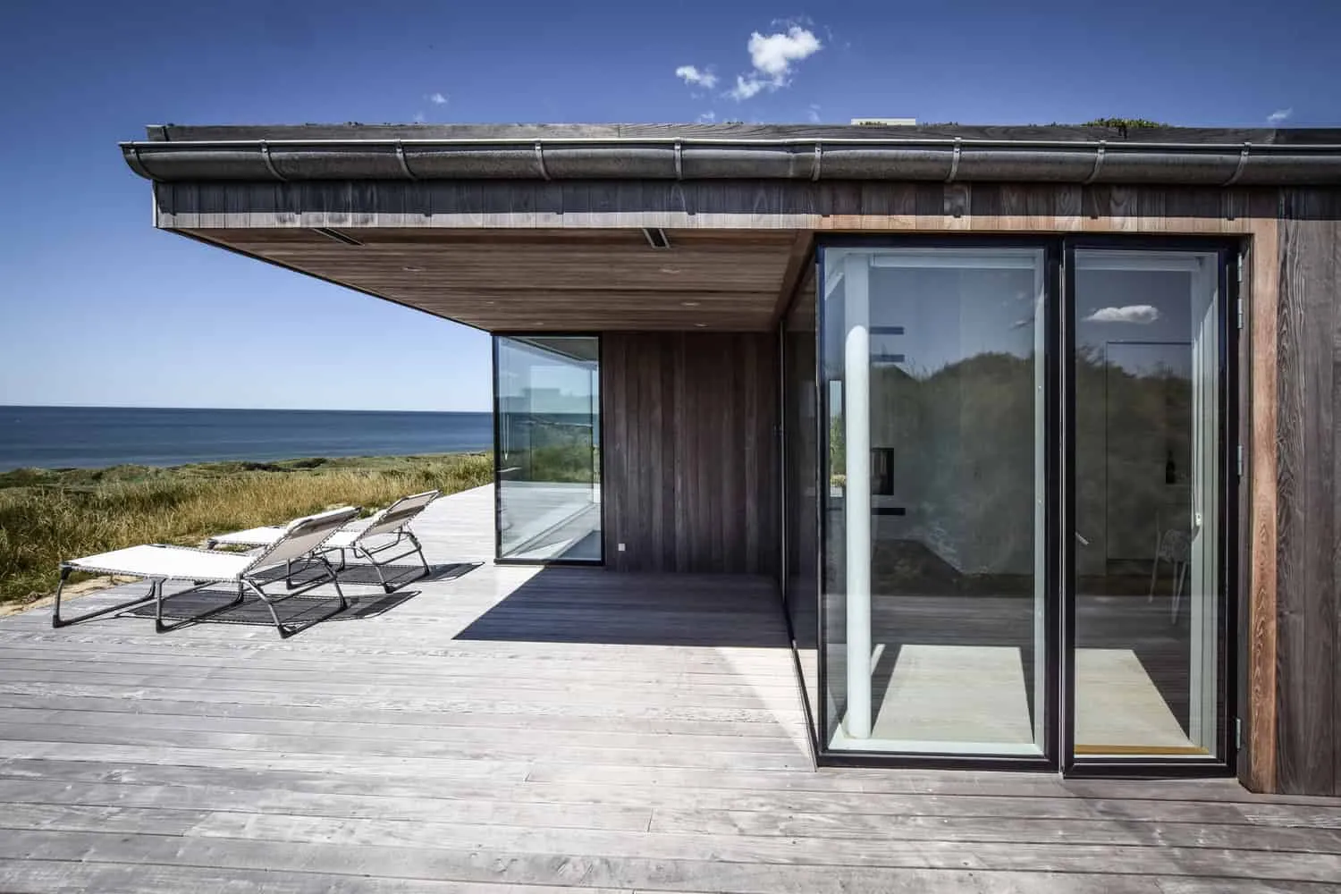 彼得疗养院——连续的木质天花板连接内部空间