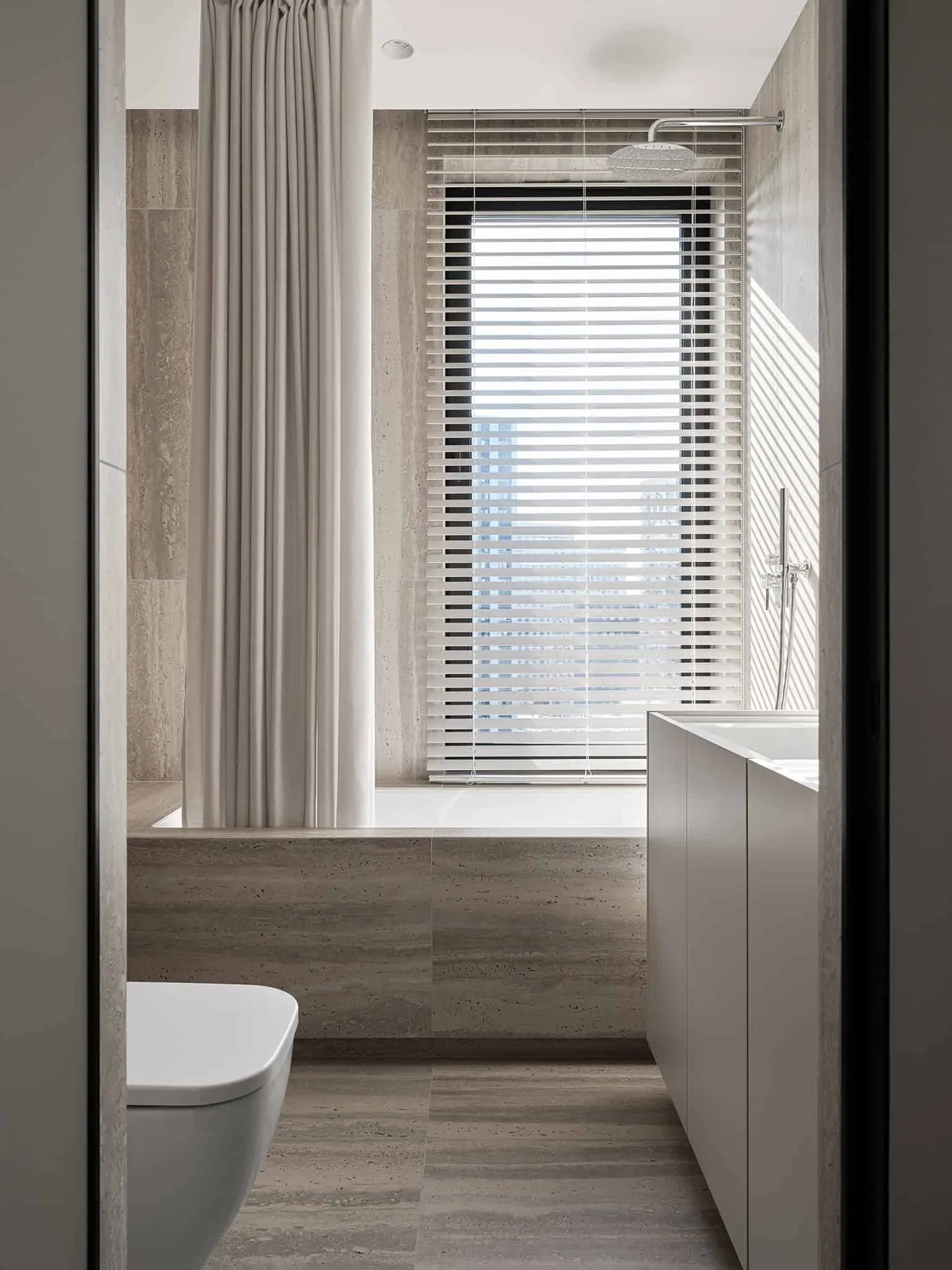 Bathroom with bathtub and large window - warm minimalism from Alexander Tishler's design studio, Moscow
