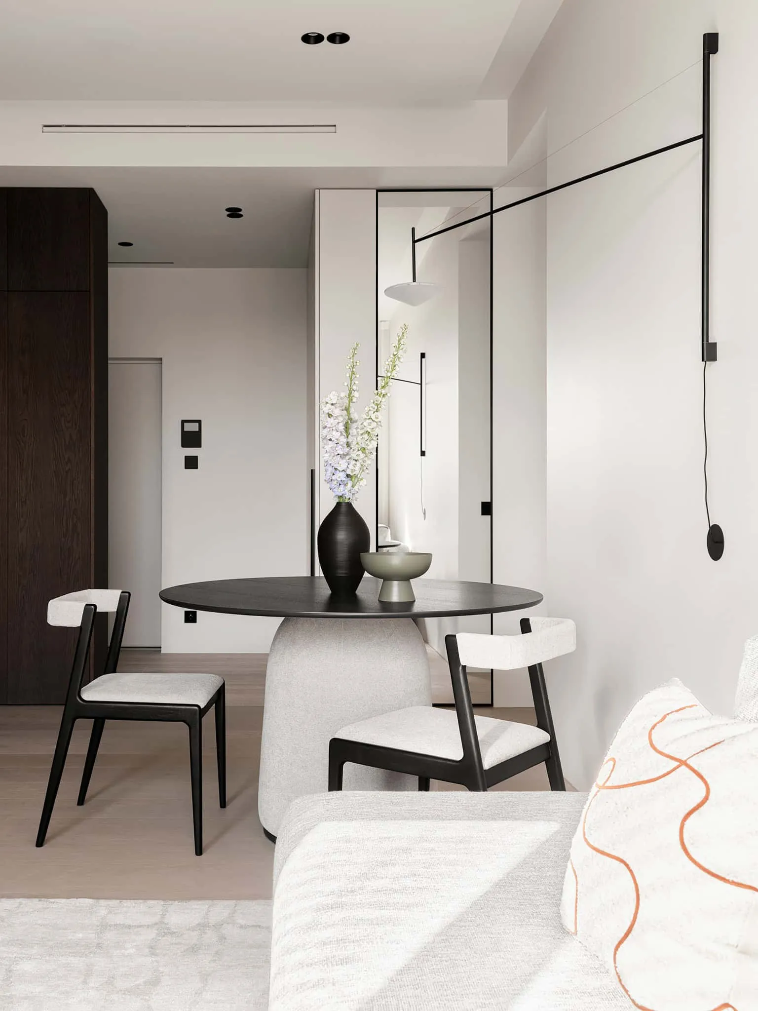 Portrait view of dining area in apartment with warm minimalism from Alexander Tishler's design studio, Moscow