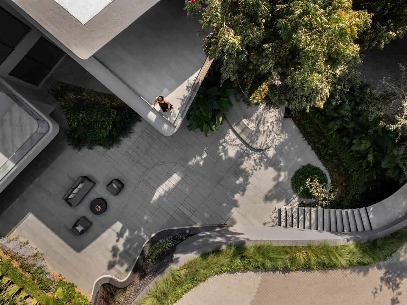 Aerial view of the lowered courtyard terrace of House NINE X NINE in Gandhinagar
