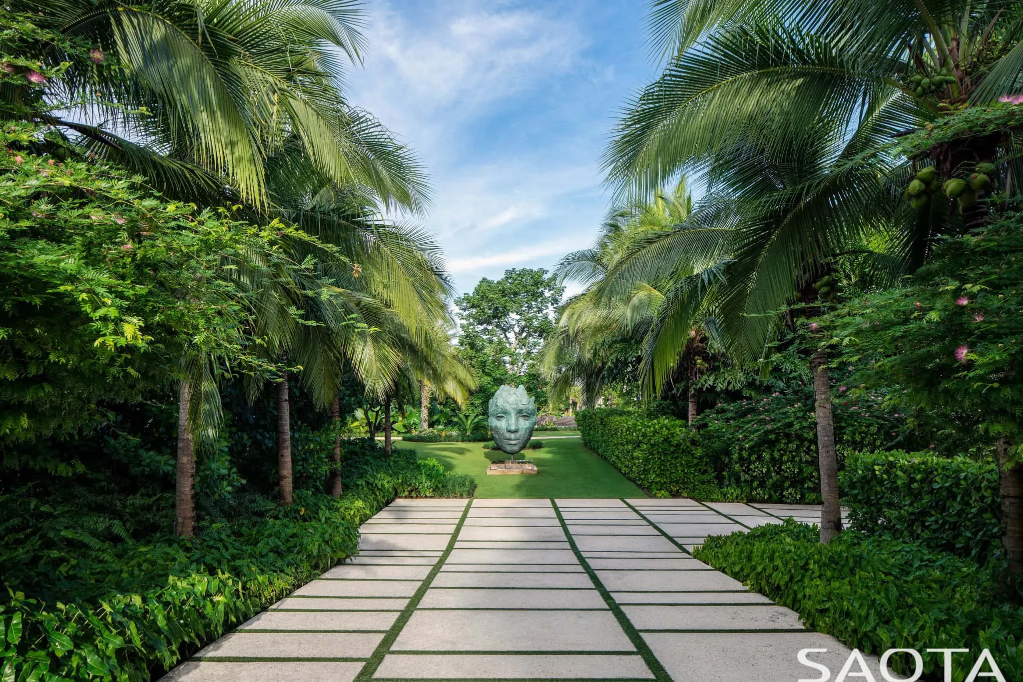 Garden alley with central sculpture