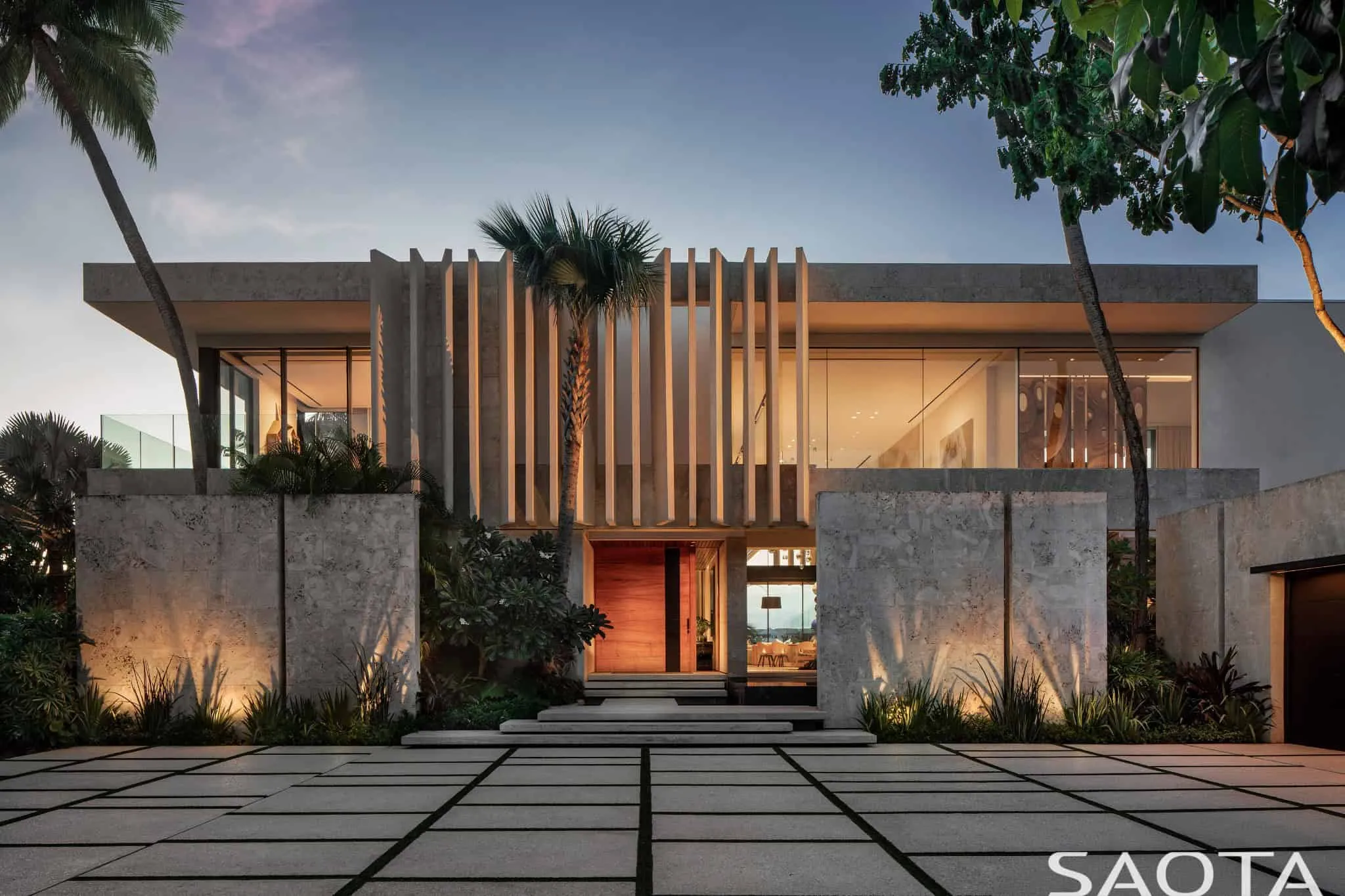 Front facade at sunset with illuminated fins