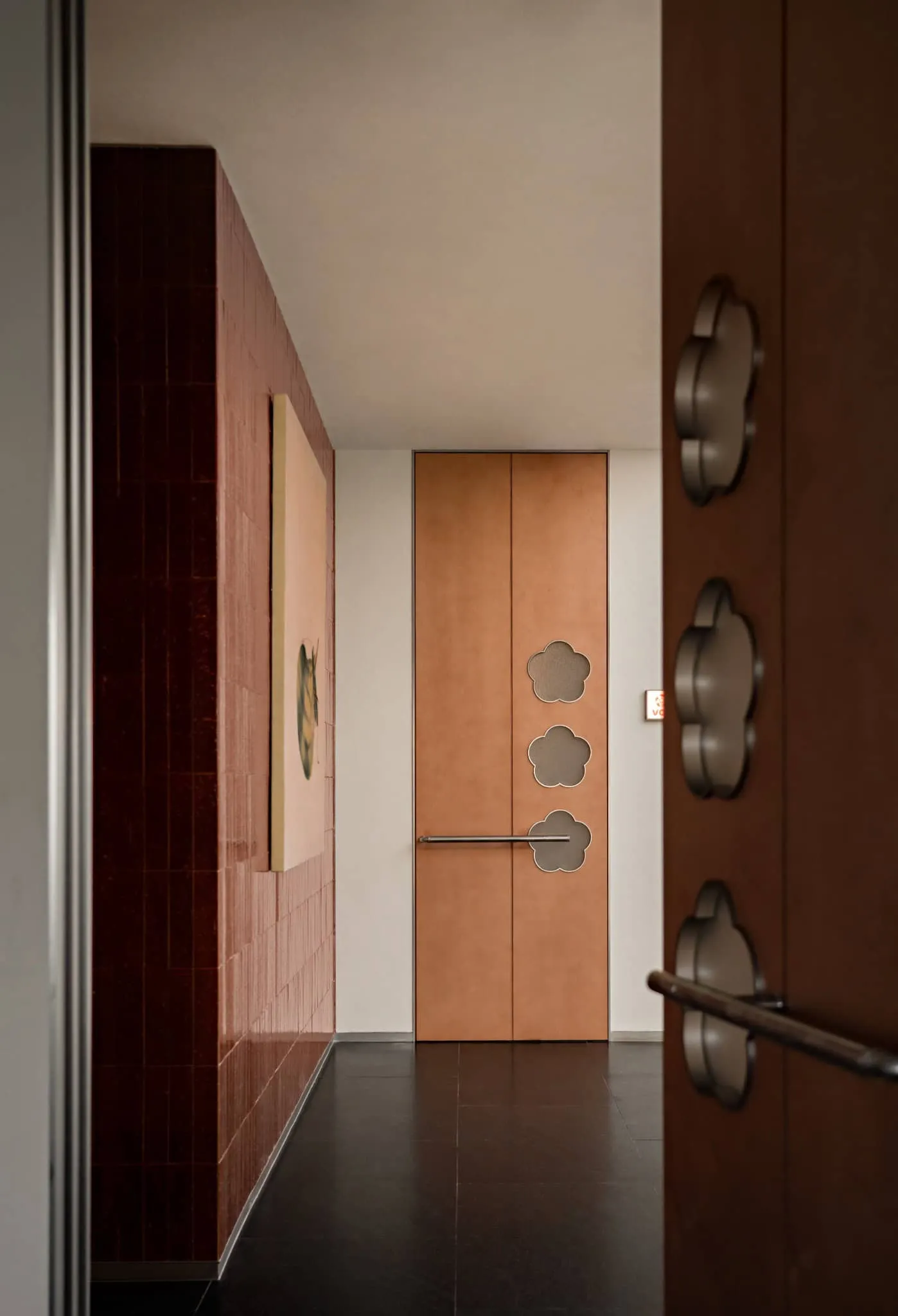 Yang Sin Lobster · Bai Jia Hu, by IN.X — private room door with cloud cutouts, Nanjing, China