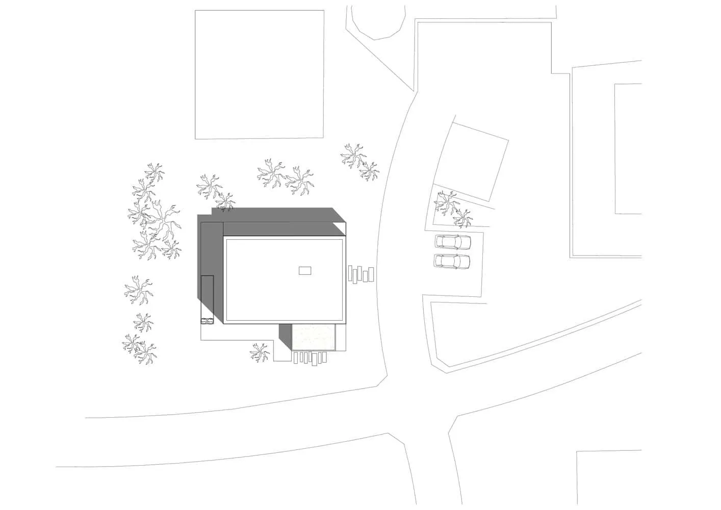 Site plan of Villa S at scale 1:200 showing relationship to forest and residential surroundings