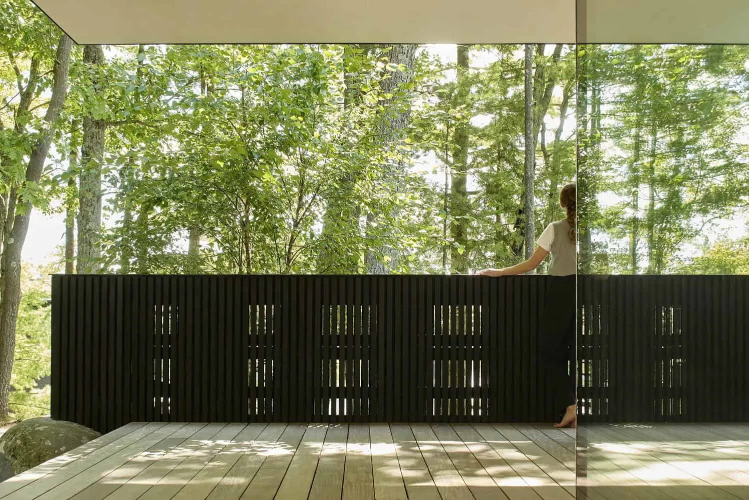 Terrace with Wooden Screen Reflecting the Forest of Sagamore North Cottage by Akb Architects, Mask