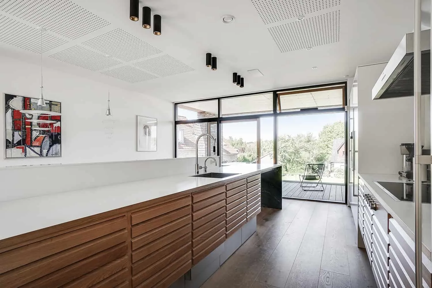 Circulation along double-height voids with framed landscape views