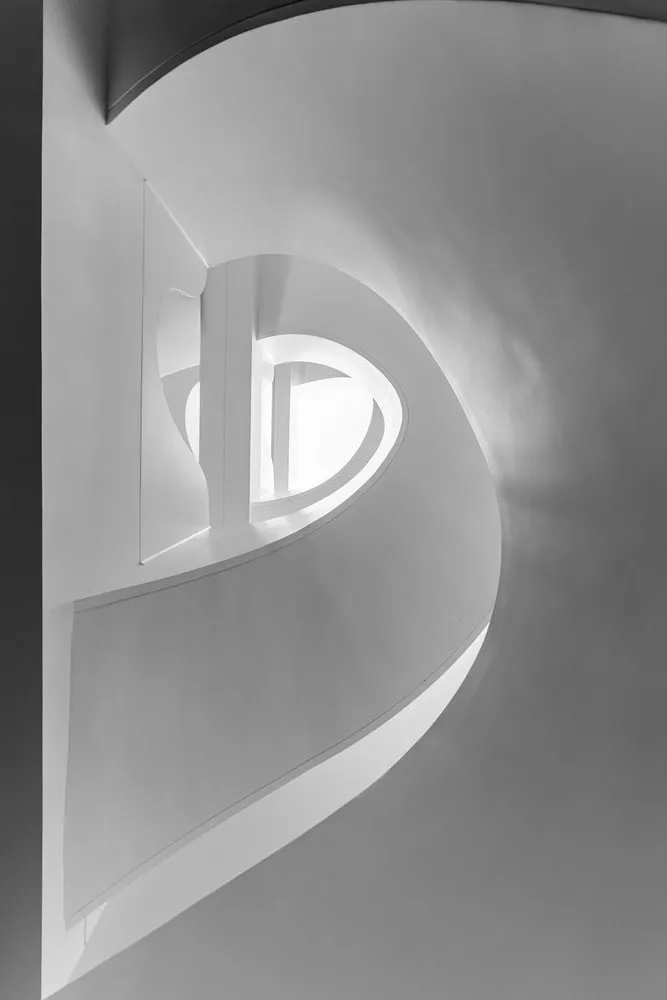 Abstract view of staircase and light well of House NINE X NINE