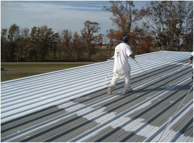 Flat building roof with cool roofing reflective coating – energy-efficient white roof designed for hot climates