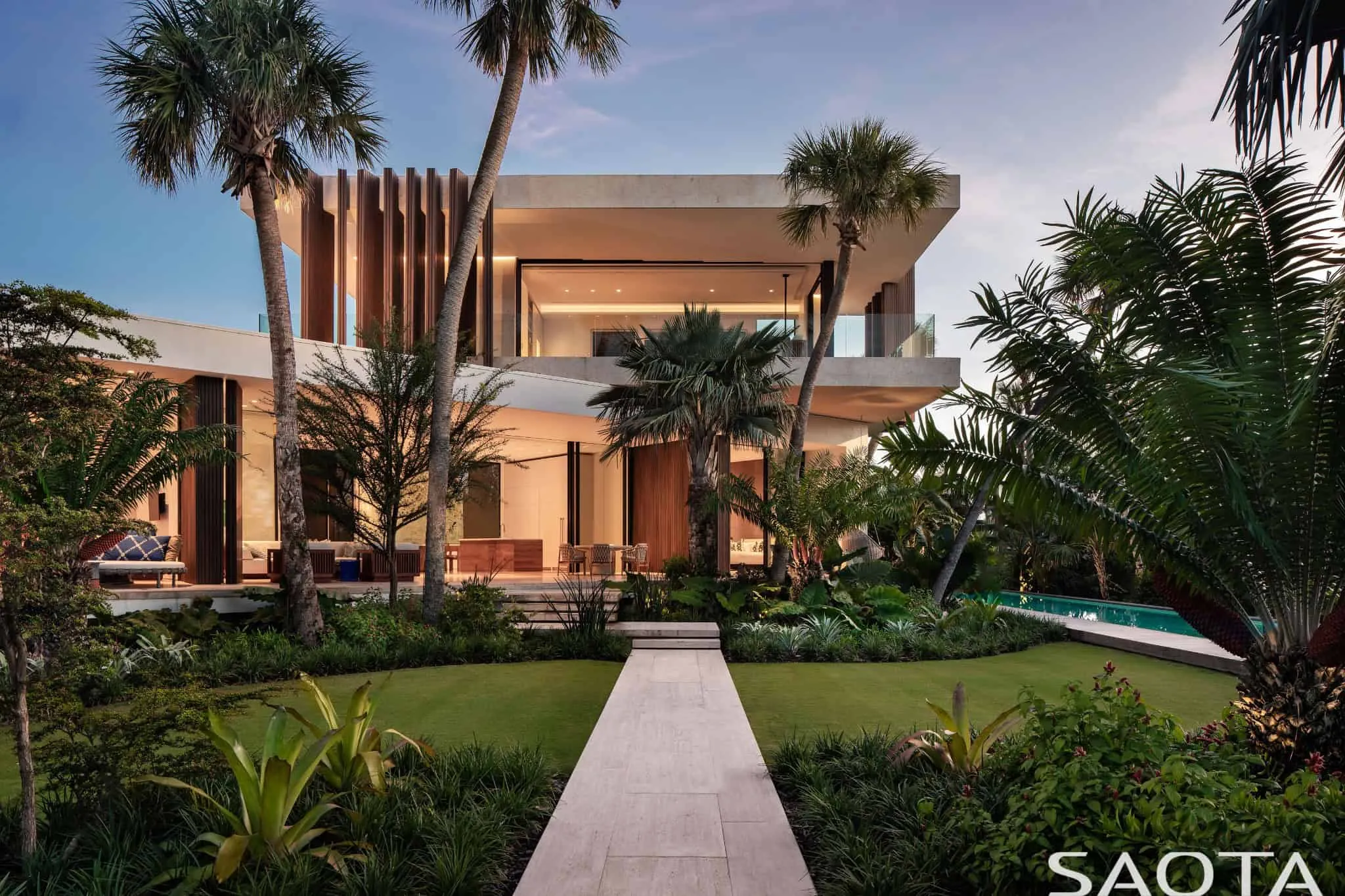 Villa Lila—Evening garden facade in Nassau, Bahamas