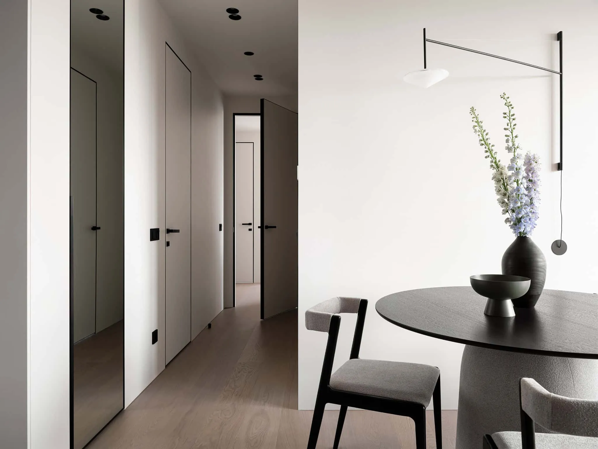 Minimalist hallway with inset doors - apartment with warm minimalism from Alexander Tishler's design studio in Moscow