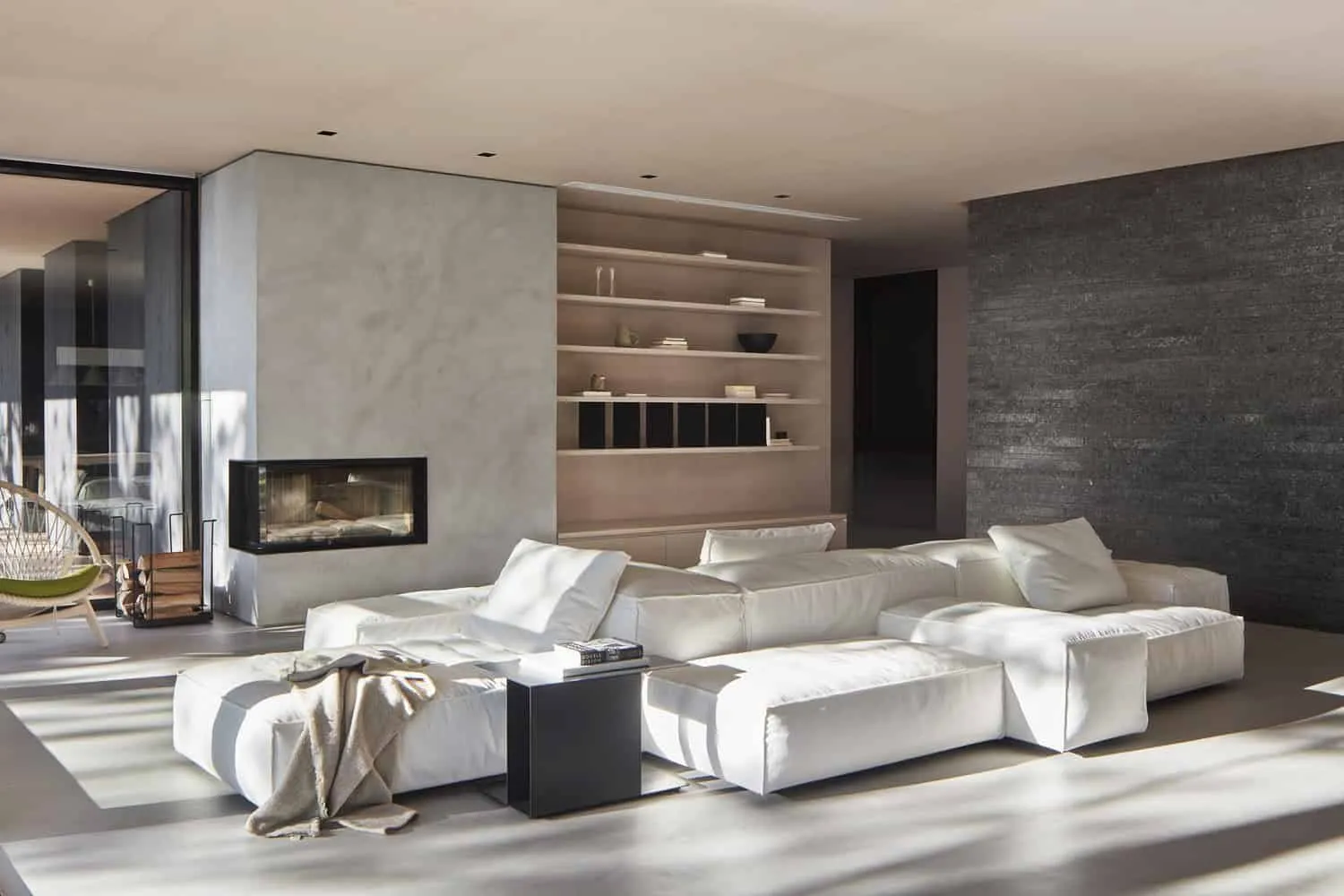 Bright Living Room with Fireplace and White Sofa of Sagamore North Cottage by Akb Architects, Mask