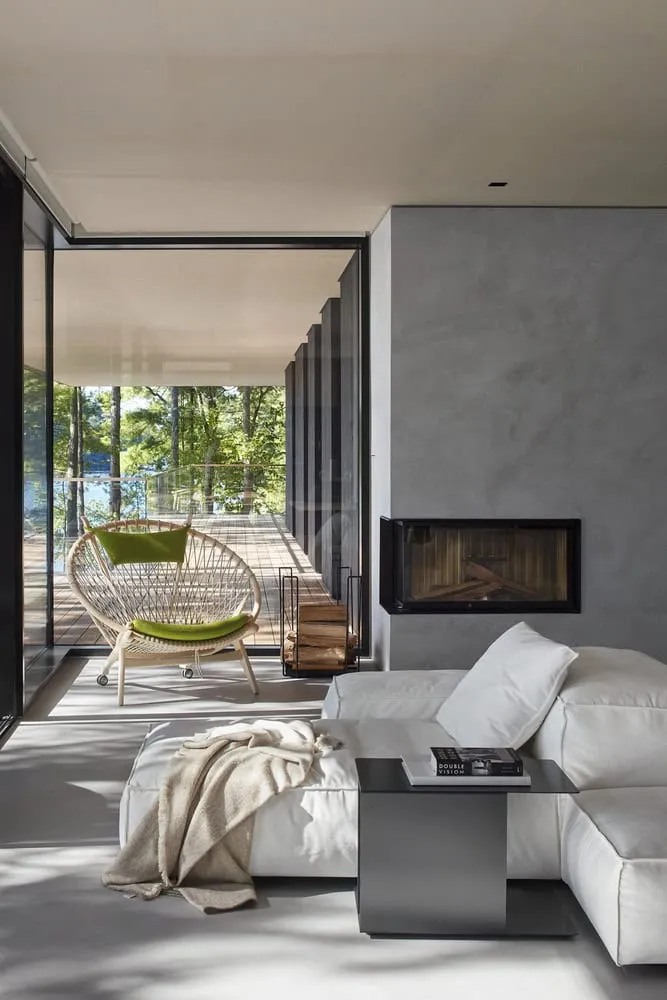 Portrait View of Living Room with Fireplace and Sofa of Sagamore North Cottage, Mask