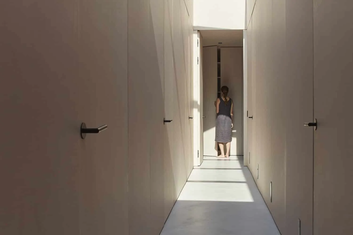 Perspective View of Corridor with Wooden Doors of Sagamore North Cottage, Mask