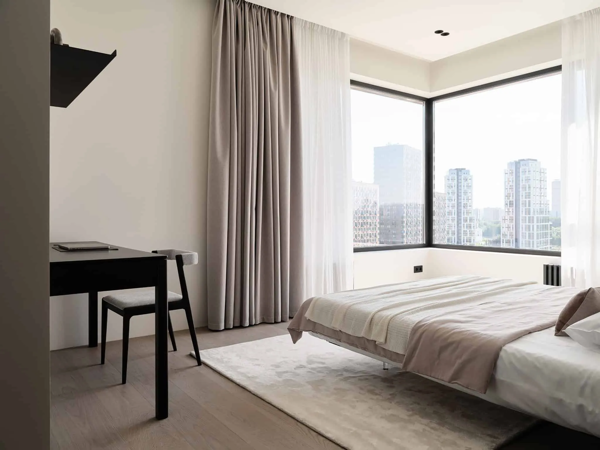 Bedroom corner with city view - warm minimalism from Alexander Tishler's design studio, Moscow