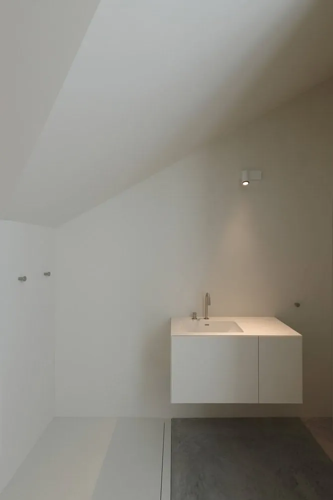 Re-folded House Minimal Vanity Slope by McLeod Bovell Modern Houses Re-folded House by McLeod Bovell Modern Houses, minimal vanity under sloped ceiling, Vancouver
