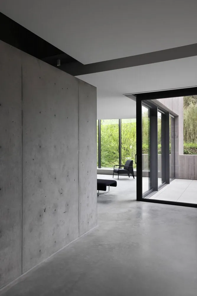 Re-folded House Concrete Corridor to Patio by McLeod Bovell Modern Houses Re-folded House by McLeod Bovell Modern Houses, concrete corridor leading to patio, Vancouver