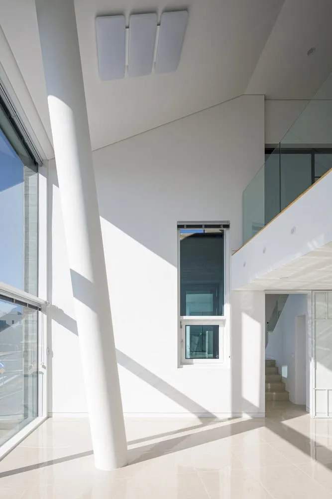 Pacific Residence Double Height Lounge Daylight by Moon Hoon
