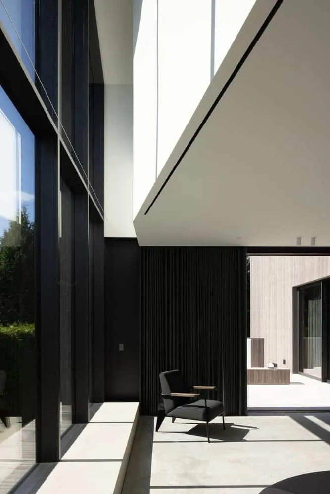 Re-folded House Double Height Glazing Courtyard by McLeod Bovell Modern Houses Re-folded House by McLeod Bovell Modern Houses, double-height glazing toward courtyard, Vancouver