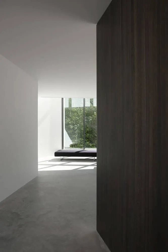 Re-folded House Minimal Corridor Bench Window by McLeod Bovell Modern Houses Re-folded House by McLeod Bovell Modern Houses, minimal corridor with bench by window, Vancouver