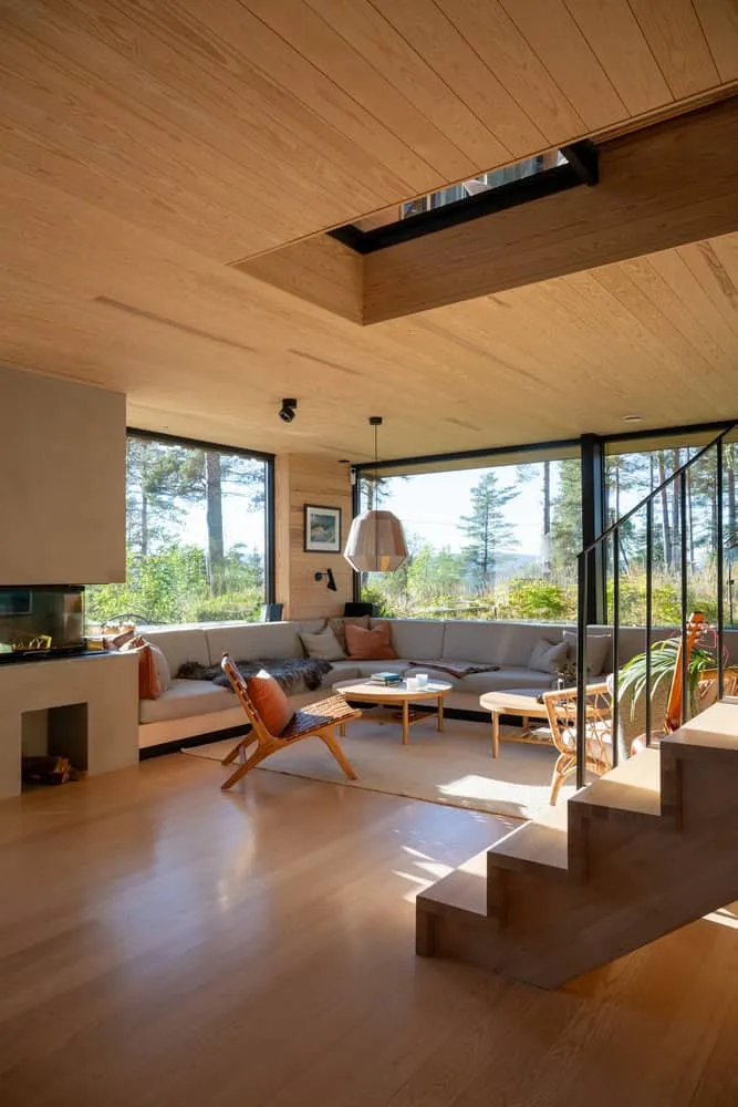 Solem Forest House Living Room by MORFEUS arkitekter Solem Forest House by MORFEUS arkitekter, warm living room corner, Norway