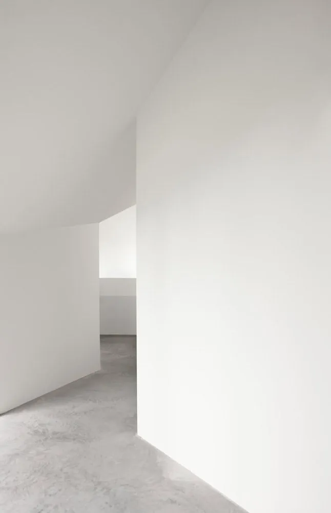 Re-folded House White Corridor Angles by McLeod Bovell Modern Houses Re-folded House by McLeod Bovell Modern Houses, white angled corridor, Vancouver