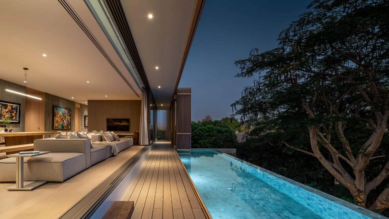 W House II Wohnzimmer mit Infinity-Pool-Terrasse von IDIN Architects