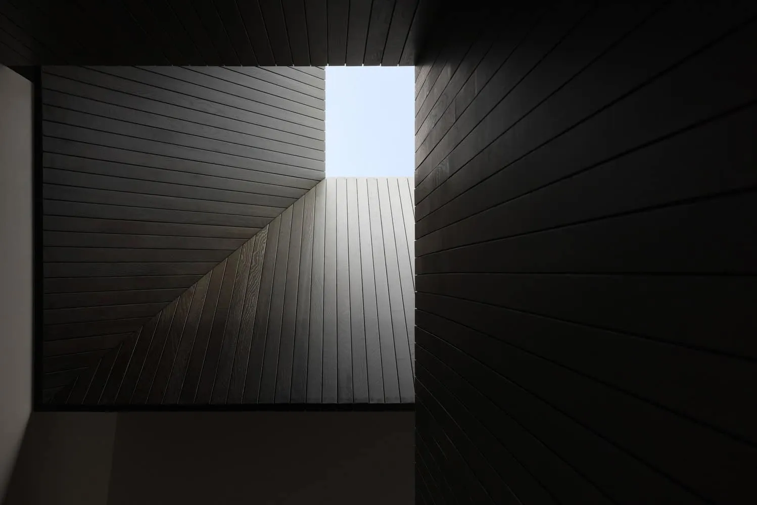 Re-folded House Skylight Oculus Wood Ceiling by McLeod Bovell Modern Houses Re-folded House by McLeod Bovell Modern Houses, skylight oculus with wood ceiling folds, Vancouver
