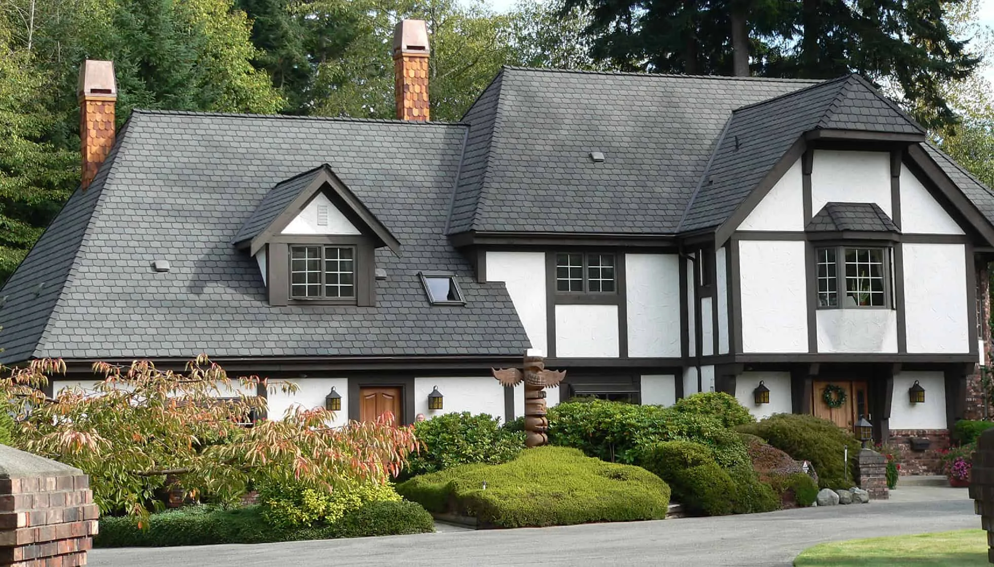 Slate Roofing – Elegant and Timeless Luxury home with natural slate roofing—timeless stone roof offering elegance, texture, and long-lasting durability