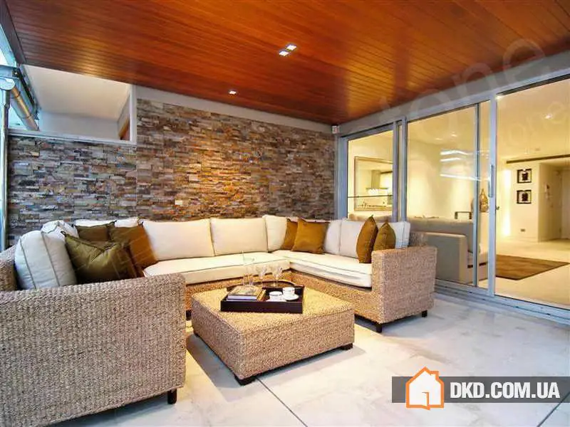 Ідеї дизайну гостьової з каменним оформленням - Gallery image 7